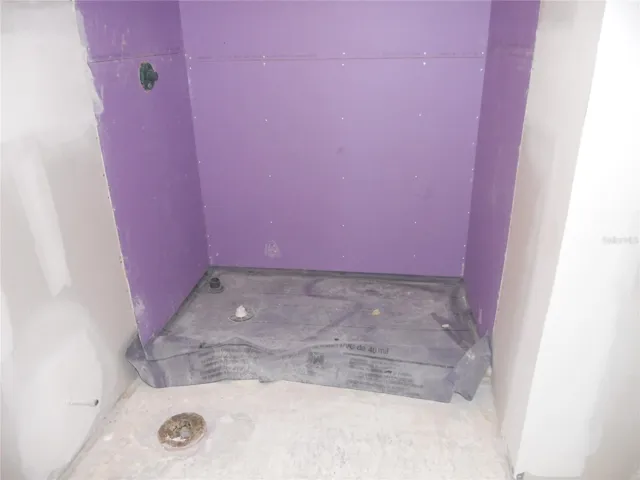 WALK-IN SHOWER AREA IS READY FOR YOUR PERSONAL TOUCHES.