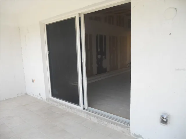 BRAND NEW HURRICANE RATED SLIDING GLASS DOORS TO THE LIVING ROOM. NEW ELECTRICAL OUTLETS.
