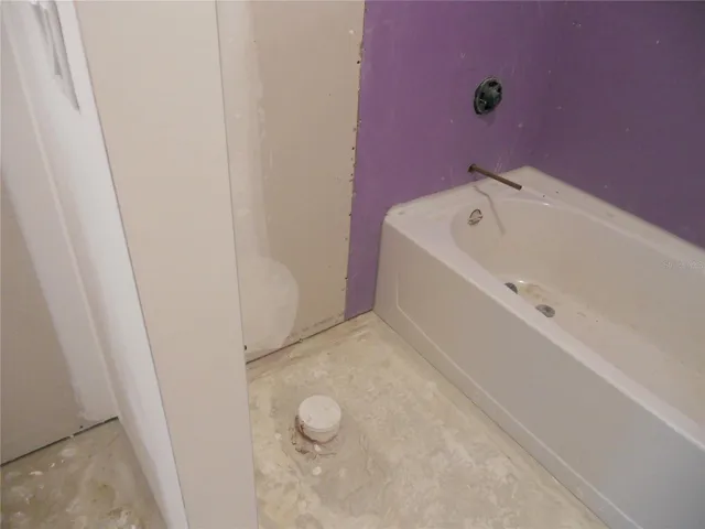 THE PLUMBING IS ROUGHED IN FOR FIXTURES AND READY FOR A BUYERS FINISHING TOUCHES.