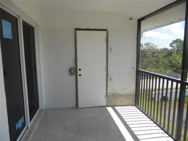STORAGE CLOSET ON BALCONY. SLIDING DOOR ON LEFT LEADS TO THE PRIMARY BEDROOM.