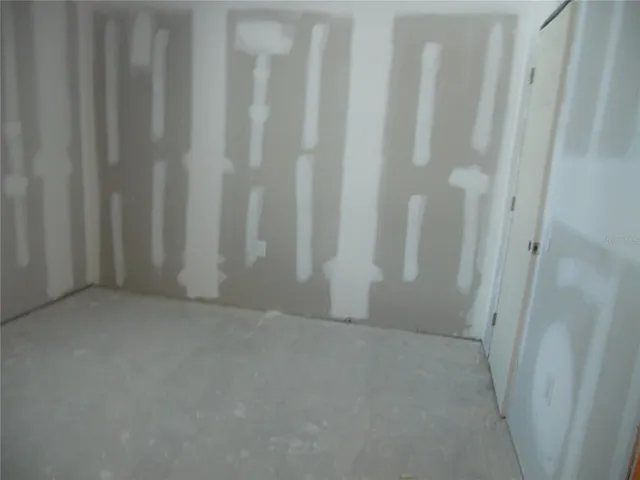 BEDROOM #2. WALK-IN CLOSET ON THE RIGHT.