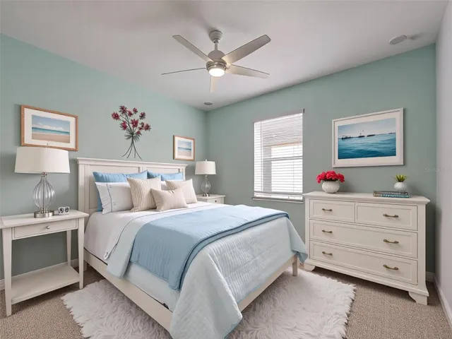 2nd bedroom with ceiling fan, new carpet, custom paint and vitural decor
