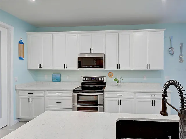 Kitchen comes with beautiful island with sink and huge Pantry!
