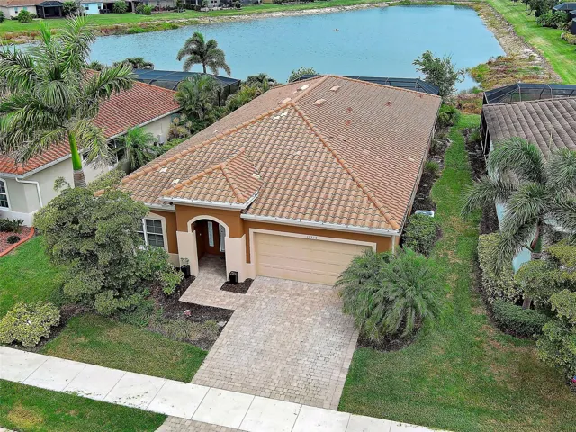 Home backs to pond with fountain
