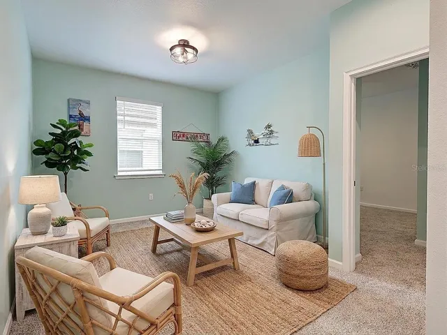 Flex room provides great option for separate sitting room for 2nd and 3 bedroom.Has virtual decor.