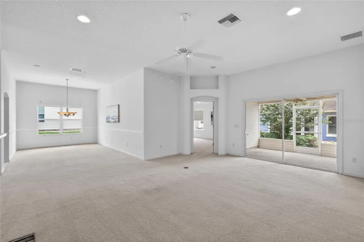 Gather in the spacious living room, where vaulted ceilings and a cozy FIREPLACE create the perfect setting for holidays and special occasions.