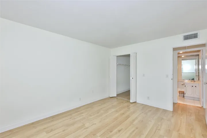 Primary bedroom is very spacious with a large walk-in closet.