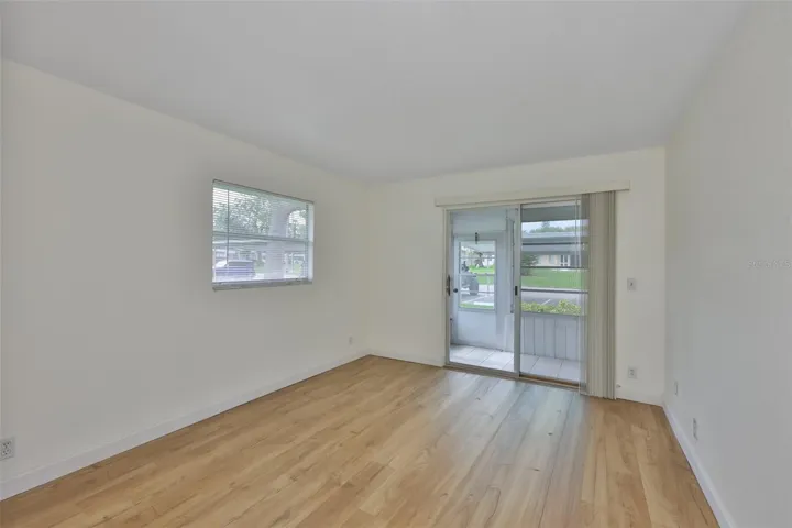 Second bedroom is spacious with sliding glass doors that go out onto the lanai.