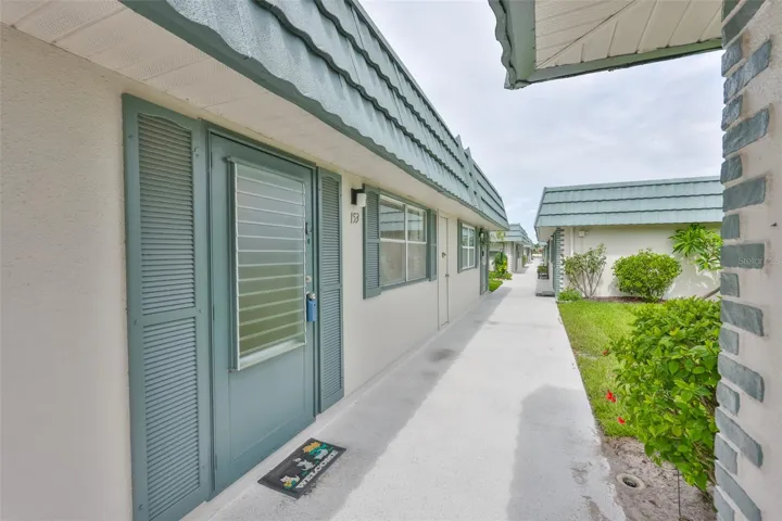 Wide walkways and spacious green lawns connect all of the units.