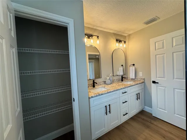 Primary bathroom with linen closet