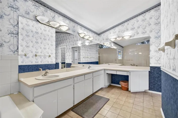 Primary ensuite bath, dual sinks and makeup vanity