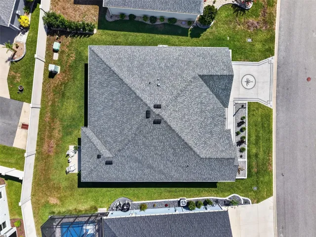 Aerial Side Elevation with Privacy Wall, Patio and Large Yard with Room For a Pool!