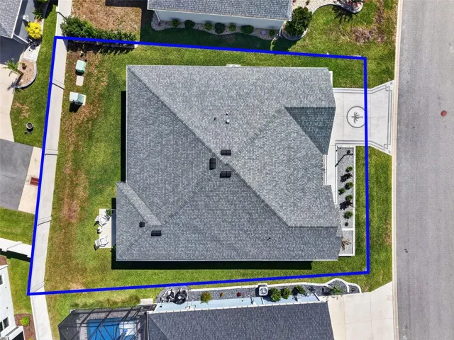 Aerial Side Elevation with Property Lines, Privacy Wall, and Large Rear Yard with Room For a Pool!