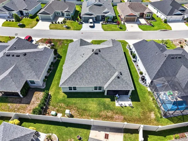 Aerial Rear Elevation with Privacy Wall, Patio and Large Yard with Room For a Pool!