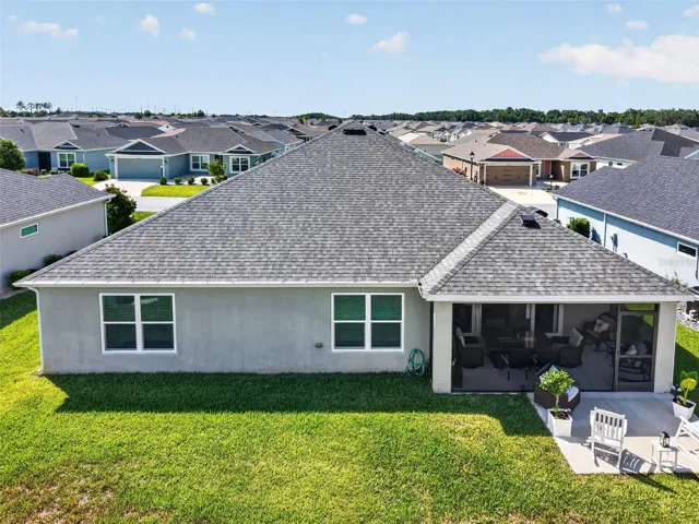 Aerial Rear Elevation with Patio and Large Yard with Room For a Pool!