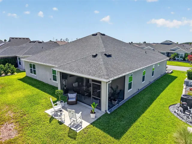 Aerial Rear Elevation with Patio and Large Yard with Room For a Pool!
