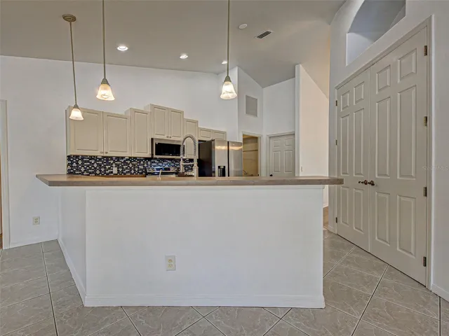 kitchen opens up to the living room