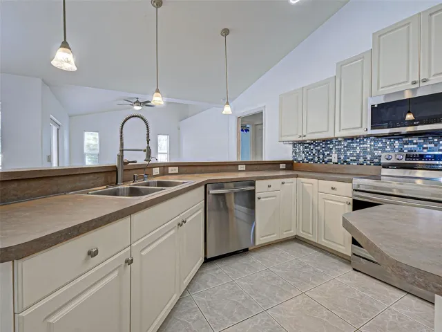 kitchen has plenty of cabinets