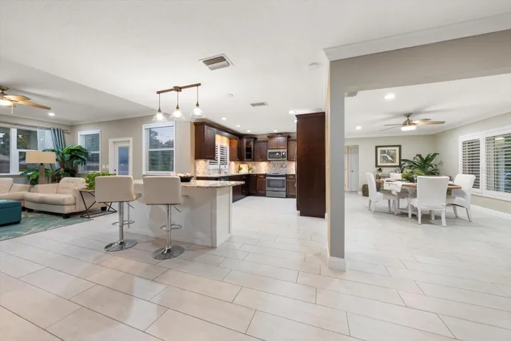 Open floorplan provides a spacious airy quality the moment one enters.
