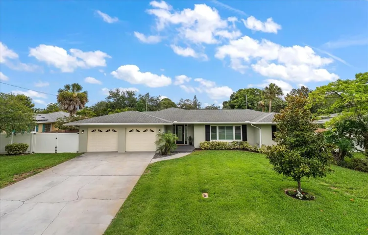 Attractive exterior with lots of room to park several vehicles.