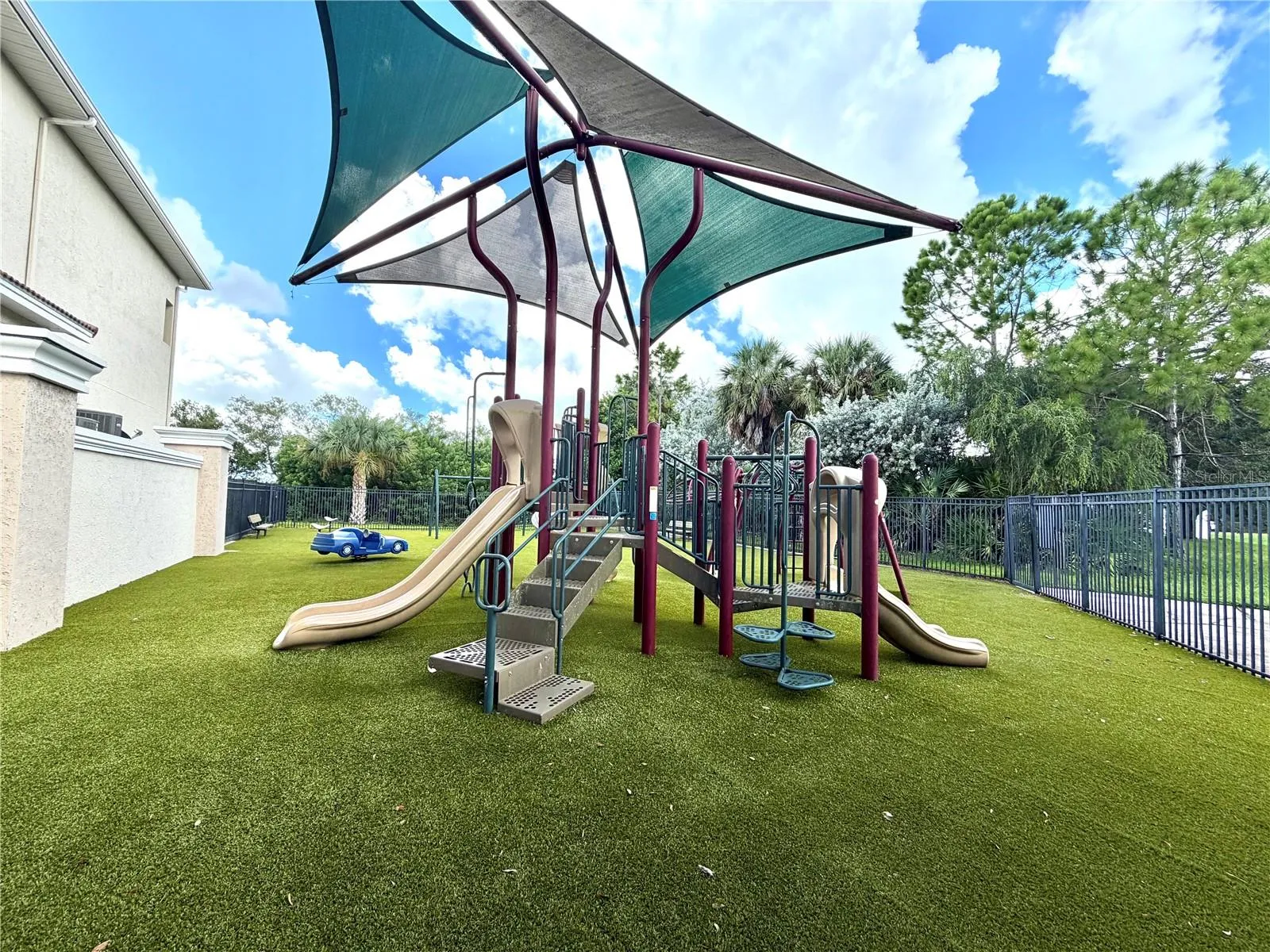Fenced community playground.