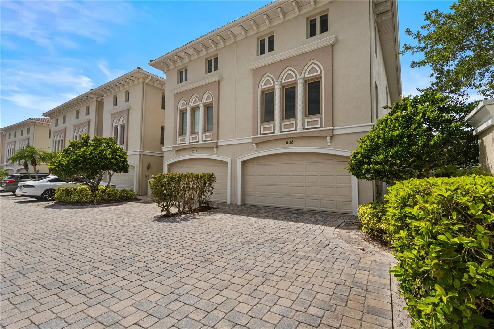 View of this premier end unit townhome with 2-car garage.