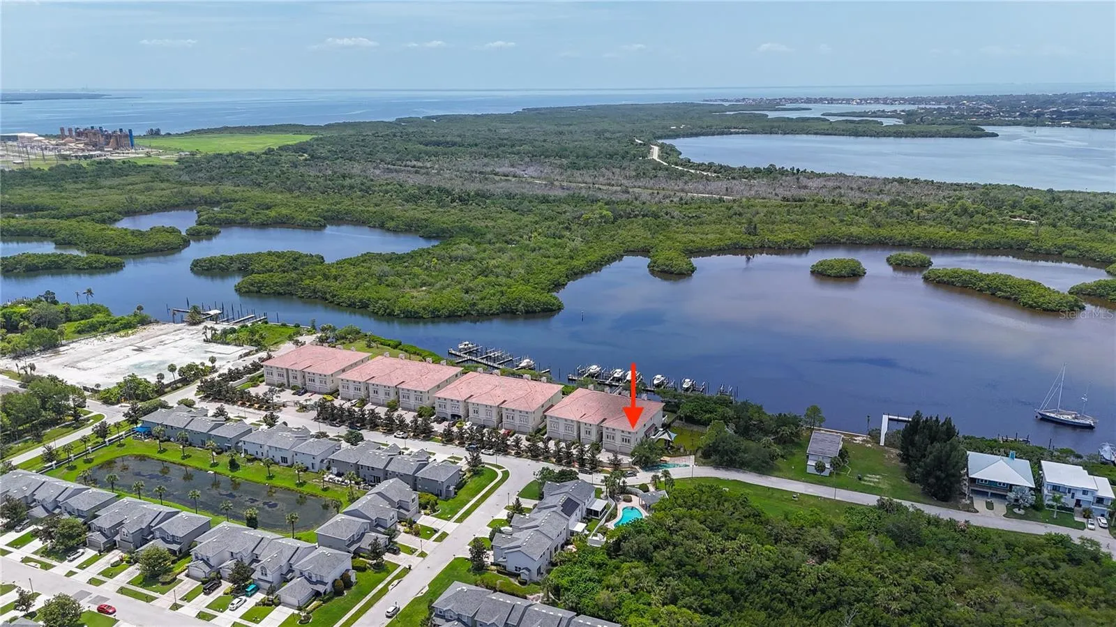 This waterfront home is located in a gated, luxury waterfront community that boaters and nature lovers will adore!