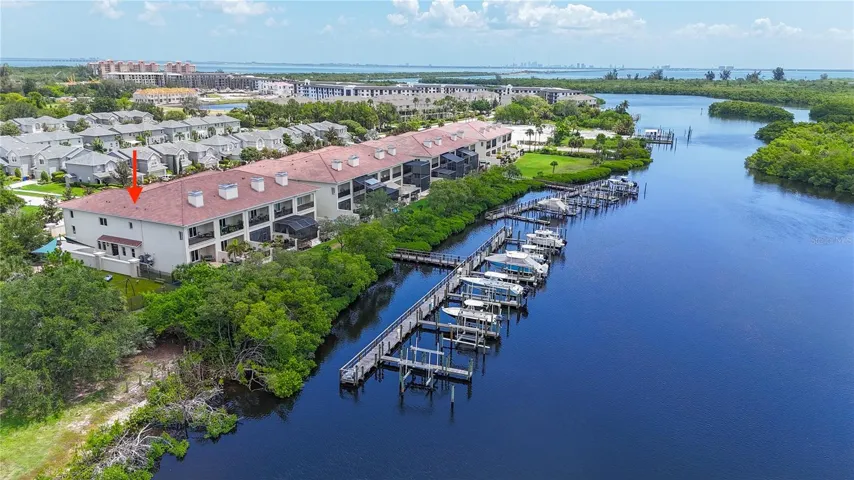 This waterfront home is located in a gated, luxury waterfront community that boaters and nature lovers will adore!