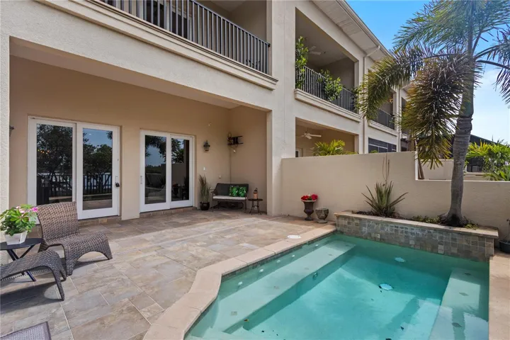Gated private patio with plunge pool. There is also a community pool across the street.