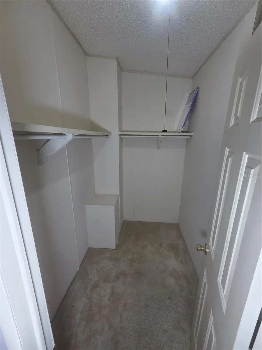 Primary walk-in closet