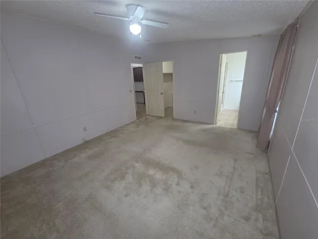 Primary bedroom from back corner