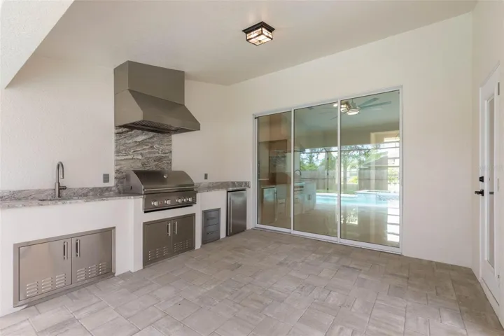 Sink, grill, hood and refrigerator