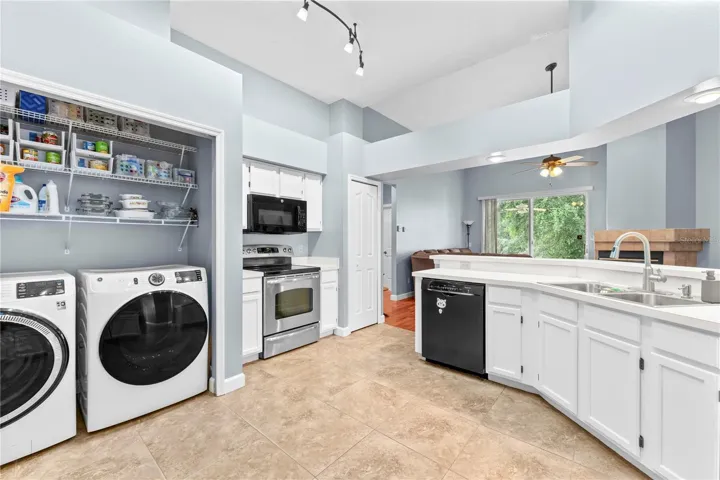 The laundry is conveniently located in the kitchen