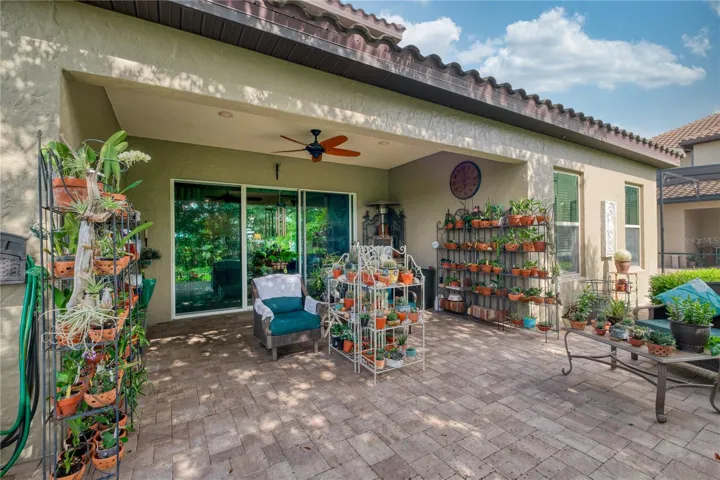 backyard porch featuring sliding doors from behind.