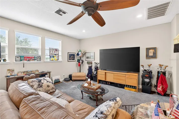 Upper Floor featuring entertaining area and carpet