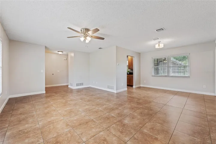 living room, looking into the dining room and foyer