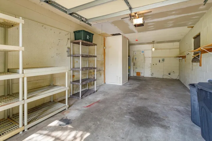 Oversized one car garage with laundry hook up and access to back yard