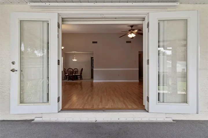 Screened In Lanai with view to the Dining Room/Living Room