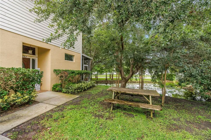 Picnic area with view of pond at front (side) door.