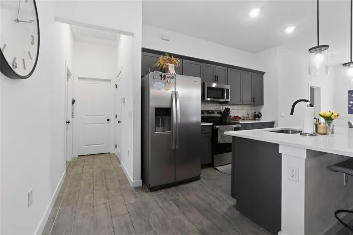 Hallway to the laundry and garage