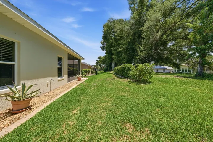 Private backyard retreat with no homes behind, offering a serene and secluded outdoor living experience.