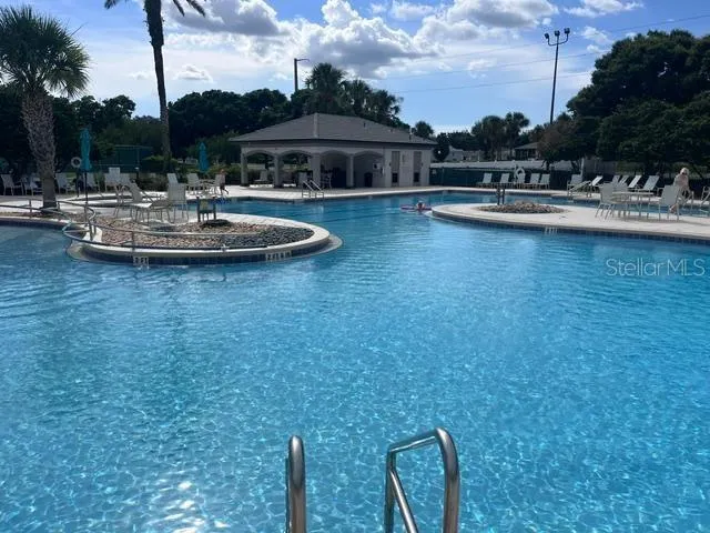 At the heart of Legacy's amenity center, the resort-style pool offers the perfect place to relax, recharge, and enjoy Florida's year-round sunshine. Whether you're taking a refreshing morning swim, participating in a water fitness class, or simply unwinding poolside with friends, the pool serves as a favorite gathering spot for residents.