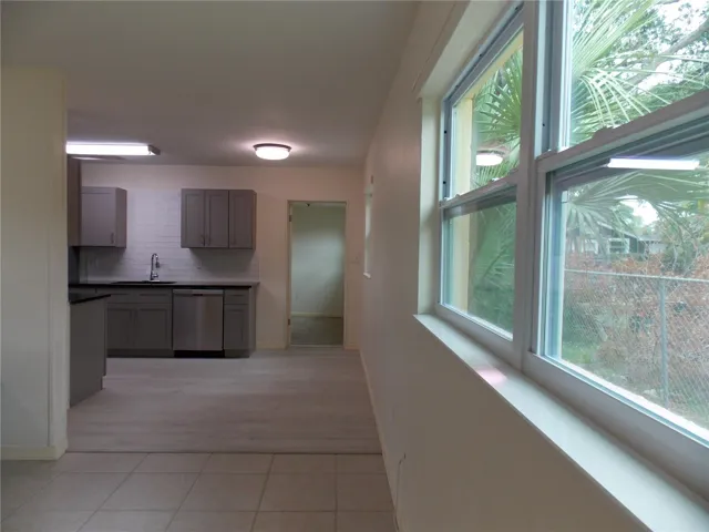 Family Room looking into kitchen dinning area.
