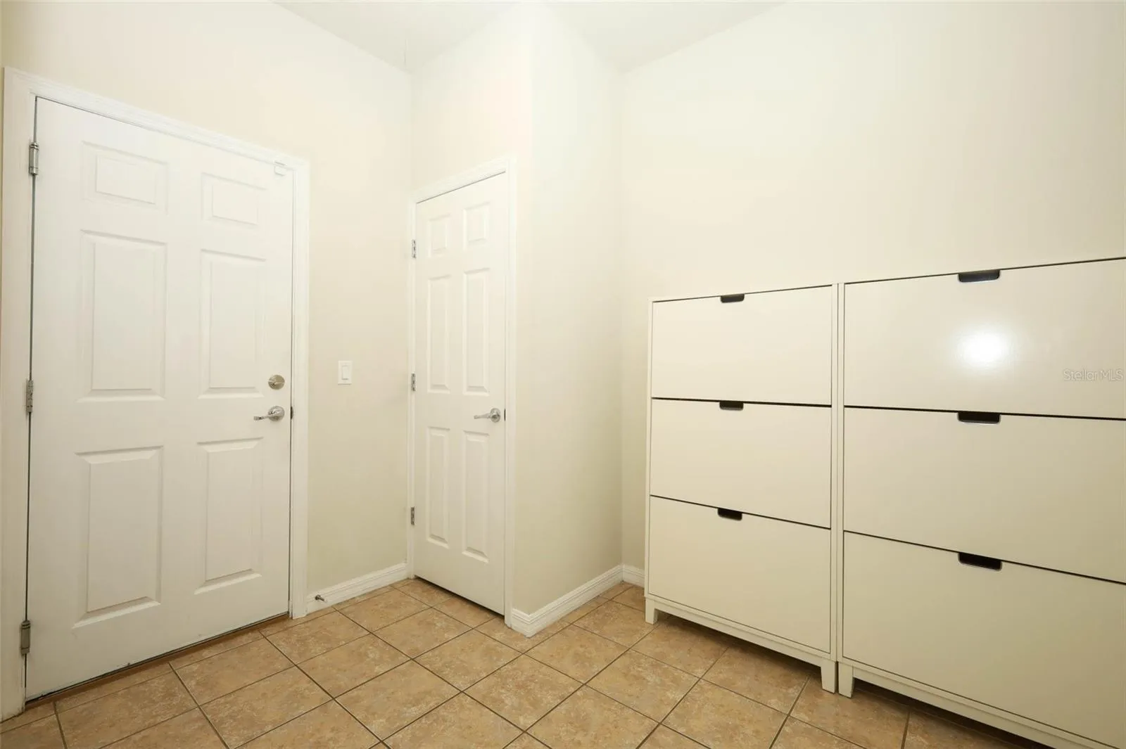 BUILT-IN SHOE RACK IN MUD ROOM