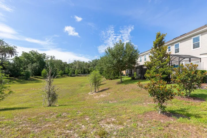 Private rear yard overlooks greenbelt