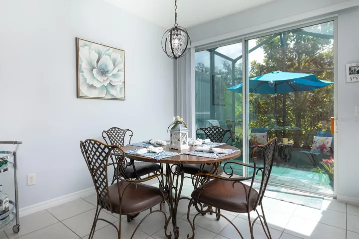 Dining area with view of screened porch and view
