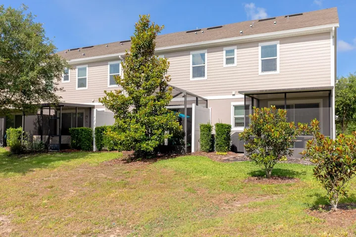 Serene green space behind townhome