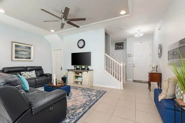 Living room with tile flooring