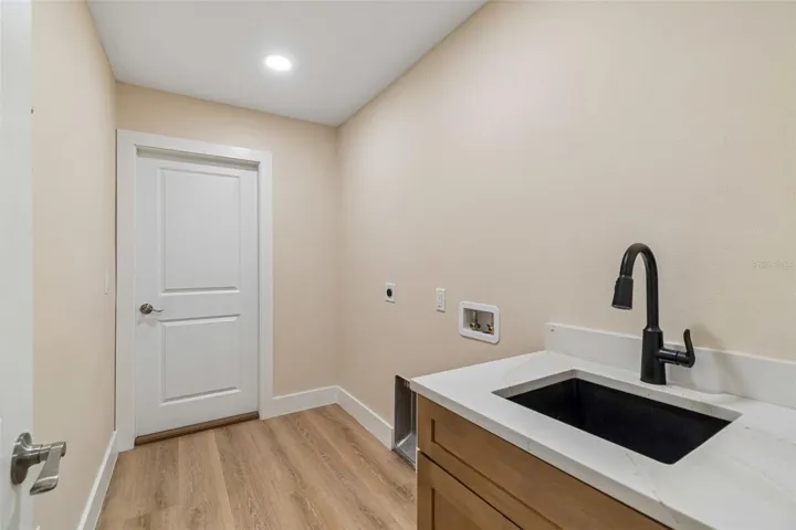 Laundry room off garage