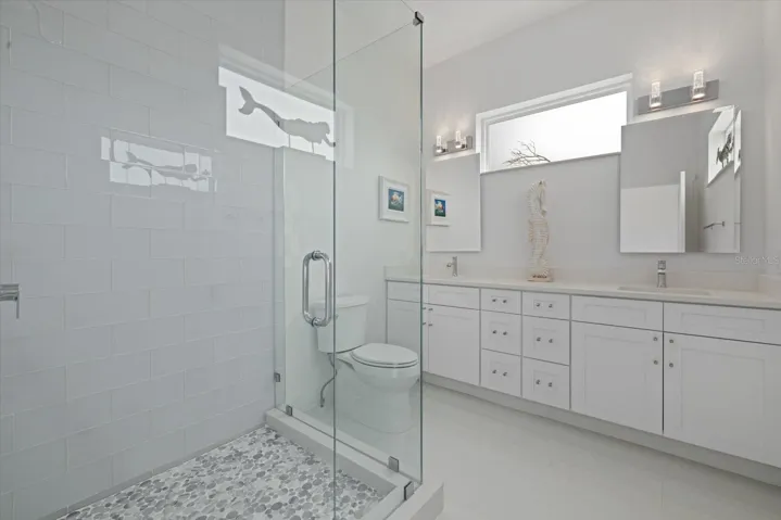 Second floor guest bathroom with dual vanity